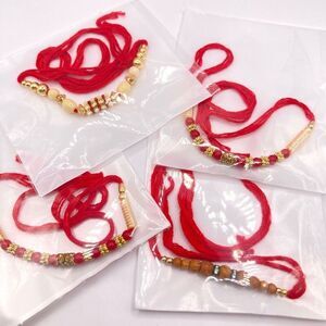 Set of 4 red thread Raakhi indie bracelets